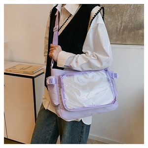 Detail of light purple ita bag with large clear PVC window and adjustable nylon strap