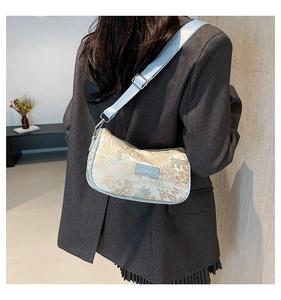 Detail of New Chinese style embroidered pillow bag with blue landscape patterns and strap