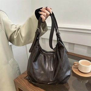 Vintage dark brown large leather tote bag for women with adjustable straps and silver hardware