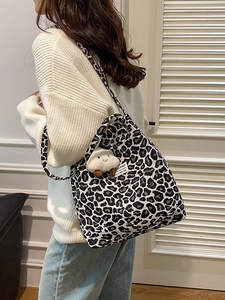 Vintage leopard print canvas tote bag with shoulder strap and cloud pendant charm