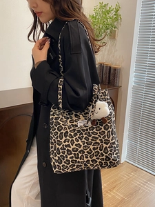 Vintage leopard print canvas tote bag with shoulder straps and plush lamb charm for women