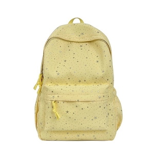 Détail du sac à dos jaune à motif d'étoiles avec poche frontale et poches latérales