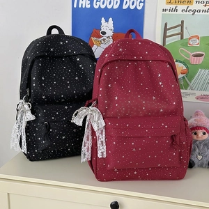 Sacs à dos scolaires noir et bordeaux à imprimé étoiles avec breloques noeuds en dentelle