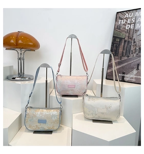 Detailed embroidery texture on traditional Chinese jacquard crossbody bag collection