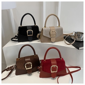Close-up of four luxury crossbody bags in beige, black, brown, and wine red leather