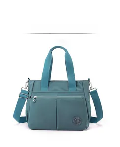 Detail view of fashion nylon tote bag showing durable material and sturdy zippers