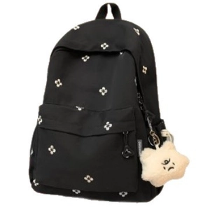 Student backpack with beige clover embroidery and plush star charm on black canvas