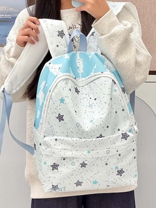 Detailed view of fashionable blue star pattern backpack with large capacity and front zip pocket