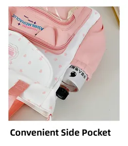 Close-up of the convenient side pocket on this cute cat-ear student backpack