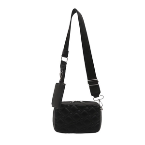 Black quilted crossbody square bag with wide adjustable strap and small earphone pouch