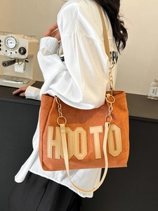 Sac fourre-tout orange en velours côtelé avec patch H00T0 pour l'école et le travail