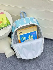 Internal view of blue star print backpack showing storage capacity for school books