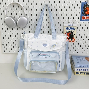 Light blue aesthetic canvas tote bag with transparent window and star pattern