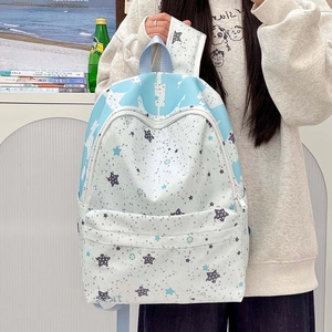 Stylish light blue star print backpack with large capacity for students and daily commuting