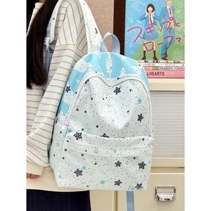 Star print large capacity backpack in blue and white patchwork with star patterns