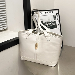 Chic cream leather tote bag with vintage metal lock and large capacity for women