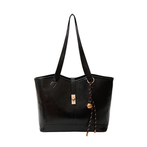 Classic black leather tote bag with gold buckle and stylish bell pendant charm