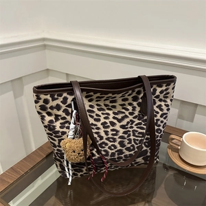 Retro leopard print tote bag with brown faux leather straps and cute bear charm pendant