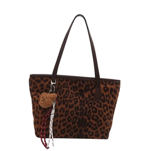 Retro leopard print tote bag with brown slim handles and cute plush bear charm accessory