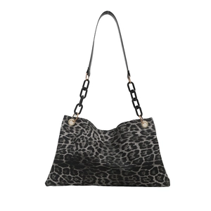 Large leopard print tote bag with thick black chain strap for versatile shoulder or crossbody use