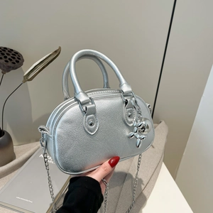 Silver textured round handbag with metallic litchi pattern, chain strap and balloon dog charm