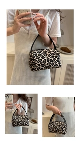 Detailed view of stylish leopard print mini handbag with black faux leather handles