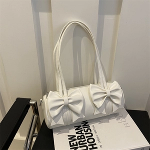 Schicke weiße Zylindertasche für Damen mit Schleife und minimalistischem urbanem Design