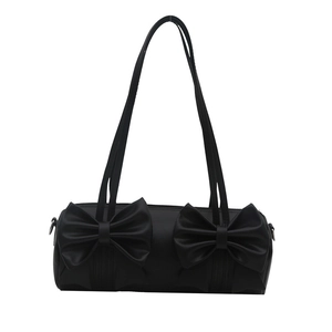 Modische schwarze Zylindertasche mit dekorativen Schleifen und schmalen Lederriemen