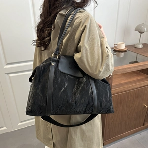 Large capacity black ruched tote bag with leather straps for travel and fitness