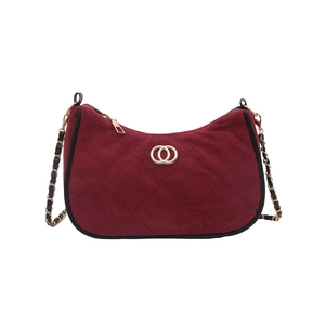 Burgundy quilted suede underarm bag with gold double-ring clasp and chain strap