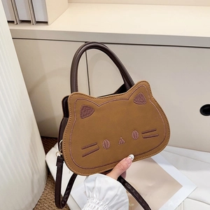 Cute brown cat-shaped shoulder bag for kids with minimalist cat face embroidery