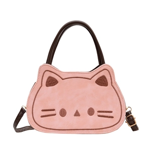 Cute pink cat-shaped shoulder bag for kids with brown handles and embroidery