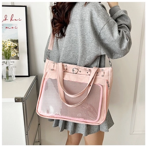 Sac Ita rose avec large fenêtre transparente en PVC et boucle en métal en forme de cœur