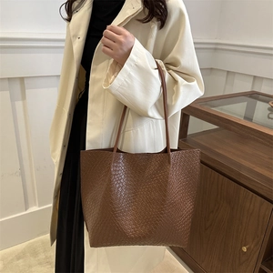 Brown woven texture tote bag with large capacity, ideal for stylish daily fashion use