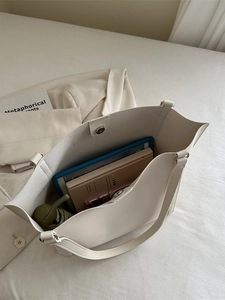 Minimalist cream white tote bag in premium faux leather with large storage capacity