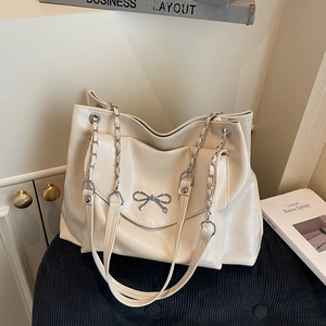 Grand sac cabas crème avec nœud métallique et bandoulière chaîne pour femmes