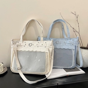 Sac ita minimaliste avec grande fenêtre transparente et volants en bleu et beige