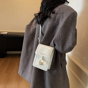 Minimalist white PU leather crossbody phone bag with fashion embossing and metal ring