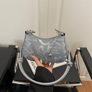 Light blue graffiti half-moon shoulder bag with silver chains and star heart pendants