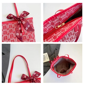Détails du sac de mariage rouge avec jacquard Xi et fermeture éclair dorée