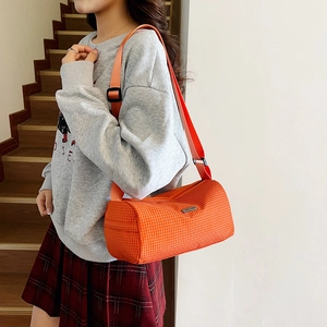 Orange plaid gym barrel bag with adjustable strap for sports and yoga travel