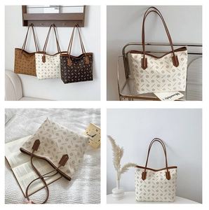 Detail view of large printed tote bags in caramel, beige, and coffee vintage monogram finish