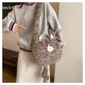 Close-up of fluffy striped cat tote bag showing plush texture and cute 3D ear details