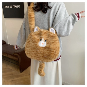 Detail of cute orange plush cat-shaped shoulder bag featuring fuzzy texture and a long tail