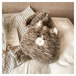 Detail of the soft plush cat-shaped tote bag showing the striped fur texture and cute ears