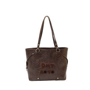 Dark brown textured tote bag with DMT AOTO plush embroidery and gold metal clips