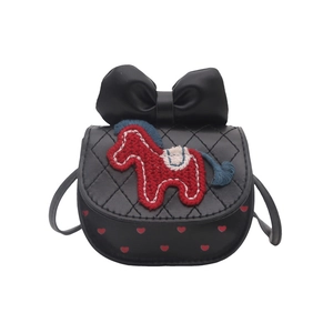 Cute black mini crossbody bag with a red bow, horse embroidery, and quilted pattern