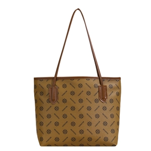 Retro brown leather tote bag with vintage geometric monogram and long shoulder straps