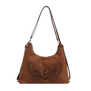 Brown frosted suede tote bag with decorative butterfly design for stylish winter commuting