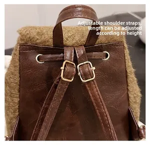 Close-up of adjustable straps and gold buckles on a wool-leather backpack